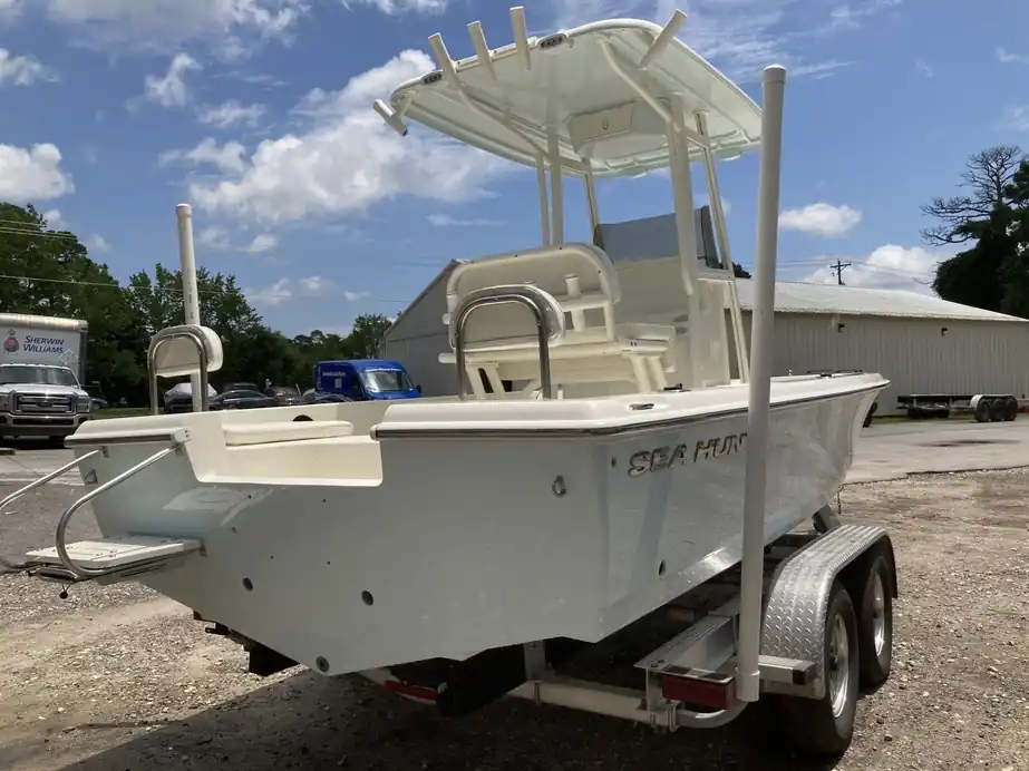 Cream Sea Hunt console seen from the stern quarter with a refinished hull